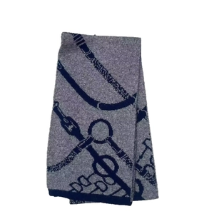 Long knitted wool scarf for women featuring gray and navy blue equestrian patterns