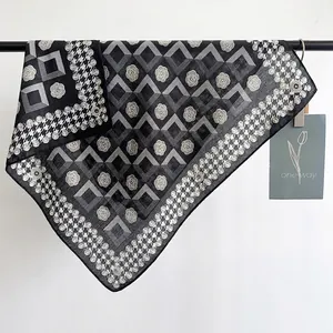 Elegant checkerboard silk scarf with camellia pattern and houndstooth border