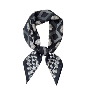 Elegant checkered silk scarf with camellia flower pattern and houndstooth texture
