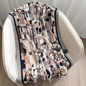 Elegant linen-cotton blend scarf with abstract geometric floral patterns and earthy tones