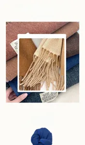 Detail showing soft cashmere-like texture and tassel fringe in various classic solid colors