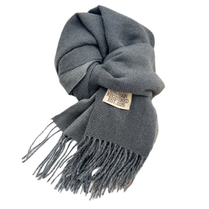 Solid charcoal grey thickened cashmere scarf with long tassels and minimal woven label