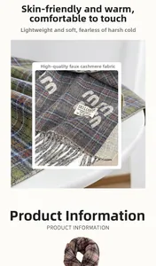 Detail showing high-quality imitation cashmere fabric texture and classic plaid scarf fringe