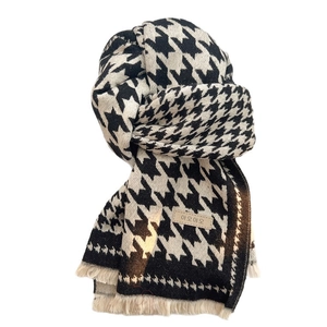 Classic black and white houndstooth cashmere-like winter scarf with soft fringe edges