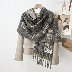 Elegant forest green and navy plaid wool scarf with letter patterns and tassel fringe