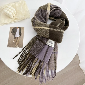 Purple and beige plaid knit scarf with soft tassels in a minimalist aesthetic