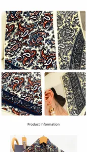 Détail d'un foulard en soie vintage français avec motif paisley et bords cousus