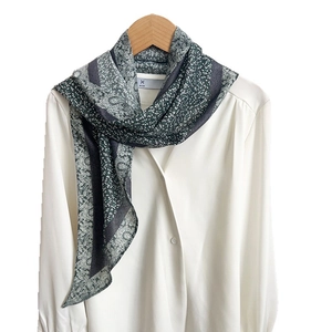 Vintage paisley print long velvet scarf in dark green and black for elegant neck styling