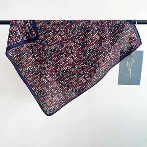 Multicolor herringbone pattern square scarf with thick blue borders and soft velvet texture