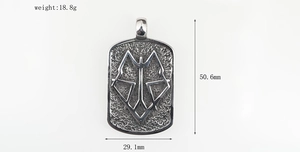Macro view showing dimensions of vintage wolf head totem pendant in stainless steel