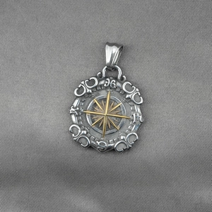 Vintage gothic compass star pendant in gold and silver finish with embossed symbols