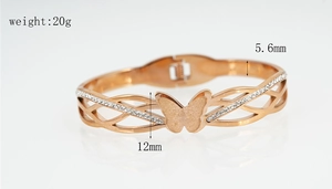 Detail view of rose gold butterfly bracelet with dimensions 12mm width and 20g weight