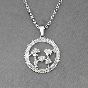 Sparkling silver couple pendant necklace featuring a boy and girl with micro pave crystals
