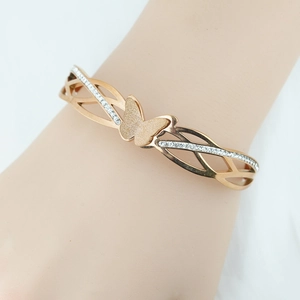 Elegant rose gold butterfly bangle featuring hollow design and sparkling rhinestones