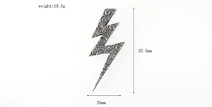 Detailed view of vintage lightning pendant with crater texture and exact size specs