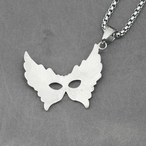 Brushed silver mask pendant necklace with shimmering rhinestones on a square box chain