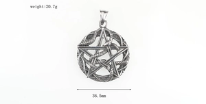Macro shot of 36.5mm star and cobra pendant in vintage silver-tone stainless steel