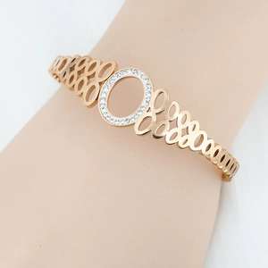 Bracelet jonc en or rose avec cercle de zircons et maillons ovales évidés élégants