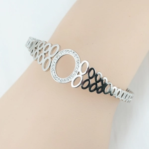 Bracelet ajouré en argent avec anneau serti de diamants et motifs ovales évidés