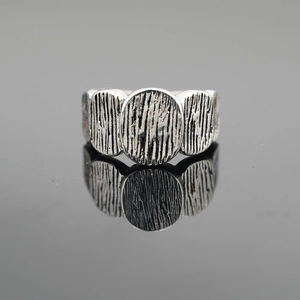 Retro oxidized silver ring for men and women featuring oval shapes and tree bark texture