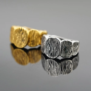 Vintage titanium steel rings for men with rustic tree bark texture in gold and silver