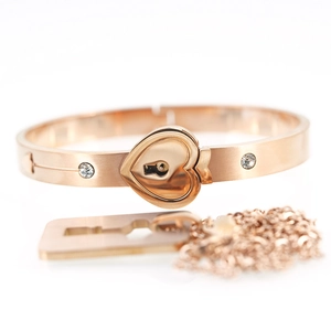 Rose gold heart lock bracelet and key necklace set with sparkling crystal accents