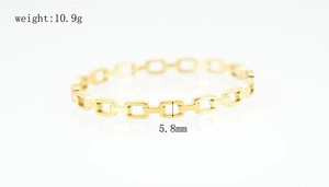 Close-up of gold chain link ring with 5.8mm width and 10.9g weight details