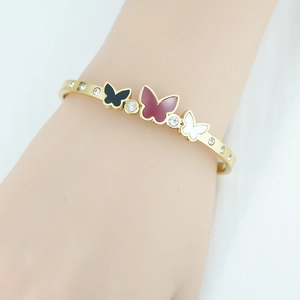 Eleganter goldener Schmetterlingsarmreif mit Emaille und Zirkonia für Damen