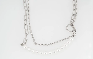 Detail of silver OT clasp with chunky chain and white pearls for men and women