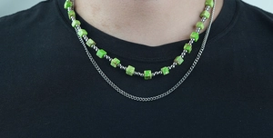 Detail of layered men's necklace with turquoise cube beads and silver steel chain link