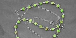 Detail of turquoise stone cube beads and stainless steel chain with lobster clasp