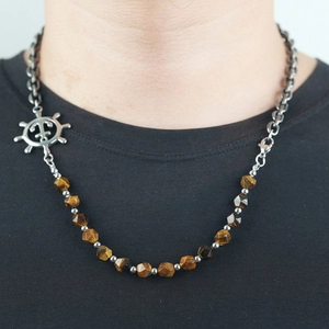 Men's nautical necklace with tiger eye beads and a vintage steering wheel helm pendant