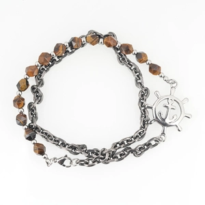 Tiger eye stone bead and silver metal chain bracelet with a nautical helm anchor charm