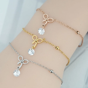 Bracelet en Acier Titane avec Nœud et Strass pour Femme Elégant Or Argent Or Rose Bracelet de Cheville Bijoux de Mode Cadeau