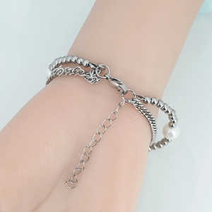 Bracelet double chaîne en acier titane argenté avec perle blanche pour femmes et hommes