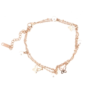 Bracelet double couche en or rose avec charmes papillon délicats et perles blanches chic