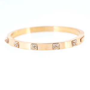 Polished rose gold stainless steel bangle with square cross patterns and zircon stones