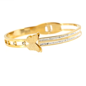 Elegant gold-tone stainless steel butterfly hinge bangle with pavé crystal accents