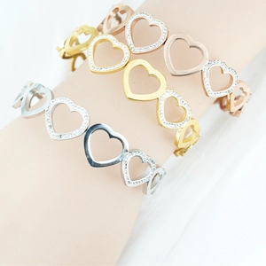 Jonc Mode Femme en Acier au Titane Cœurs Creux Reliés Bracelet Luxueux en Acier Inoxydable Zircone Bijoux de Fête Élégants