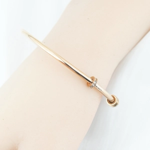 Bracciale a forma di chiodo oro rosa con cristalli pavé scintillanti da donna