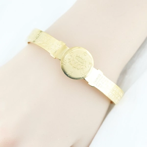 Golden lotus engraved buddhist sutra cuff bracelet with adjustable opening design