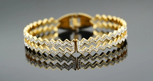 Macro detail of gold double-layer chevron bracelet with sparkling zircon stones