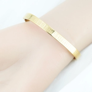 Poliertes goldenes Edelstahl-Armband mit eingraviertem buddhistischem Herz-Sutra