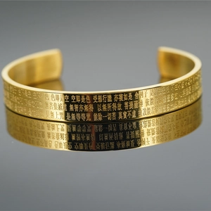 Gold-plated stainless steel open cuff bracelet with engraved Chinese Heart Sutra