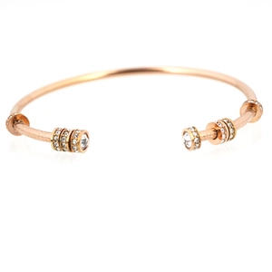 Bracciale rigido in titanio oro rosa con cristalli scintillanti e finitura spazzolata