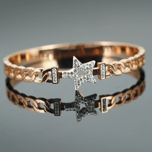 Rose gold star cuff bracelet with sparkling pavé diamonds and cuban chain details