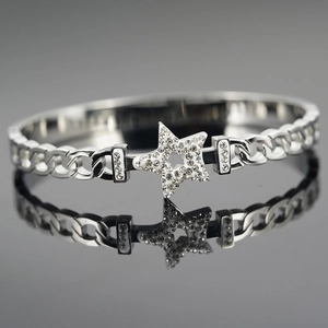 Polished titanium steel chain bracelet with crystal encrusted star pendant for women