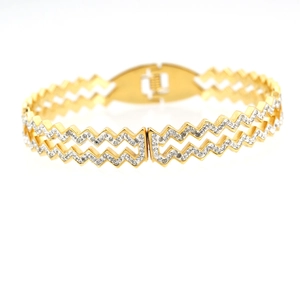 Gold double-layered zigzag bangle with full cubic zirconia inlay and folding clasp