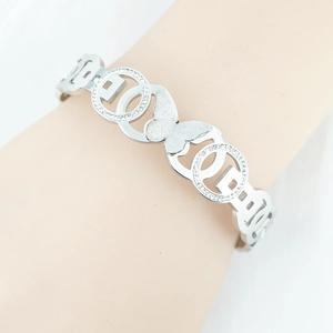 Silver stainless steel butterfly bangle with frosted hollow design and sparkling crystals