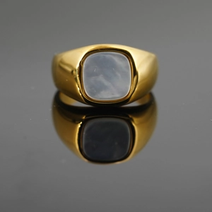 Gold plated titanium steel ring with rectangular mother of pearl inlay on mirror surface